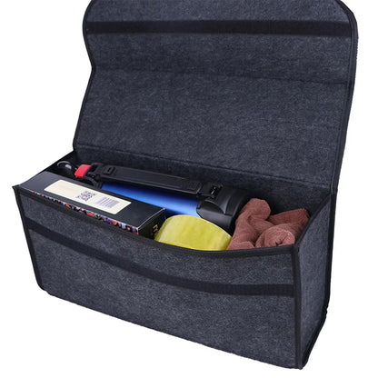 Felt car trunk organizer open, loaded with bottles and tools